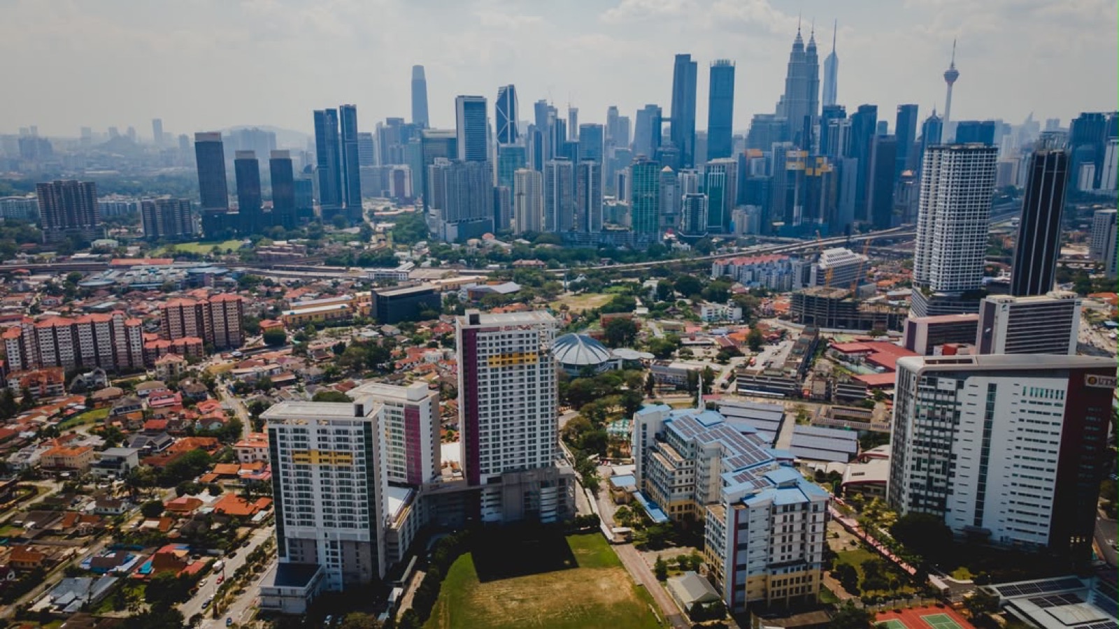 UTM Kuala Lumpur campus with the KL city skyline behind it